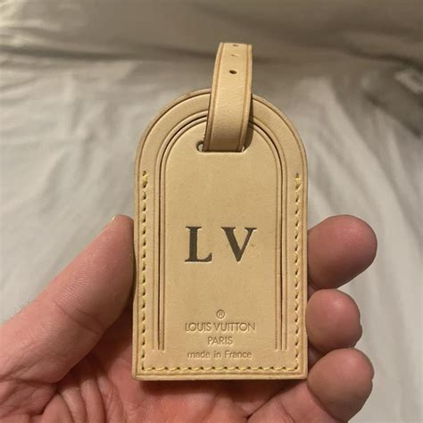 louis vuitton tag on backpack|Louis Vuitton suitcase price.